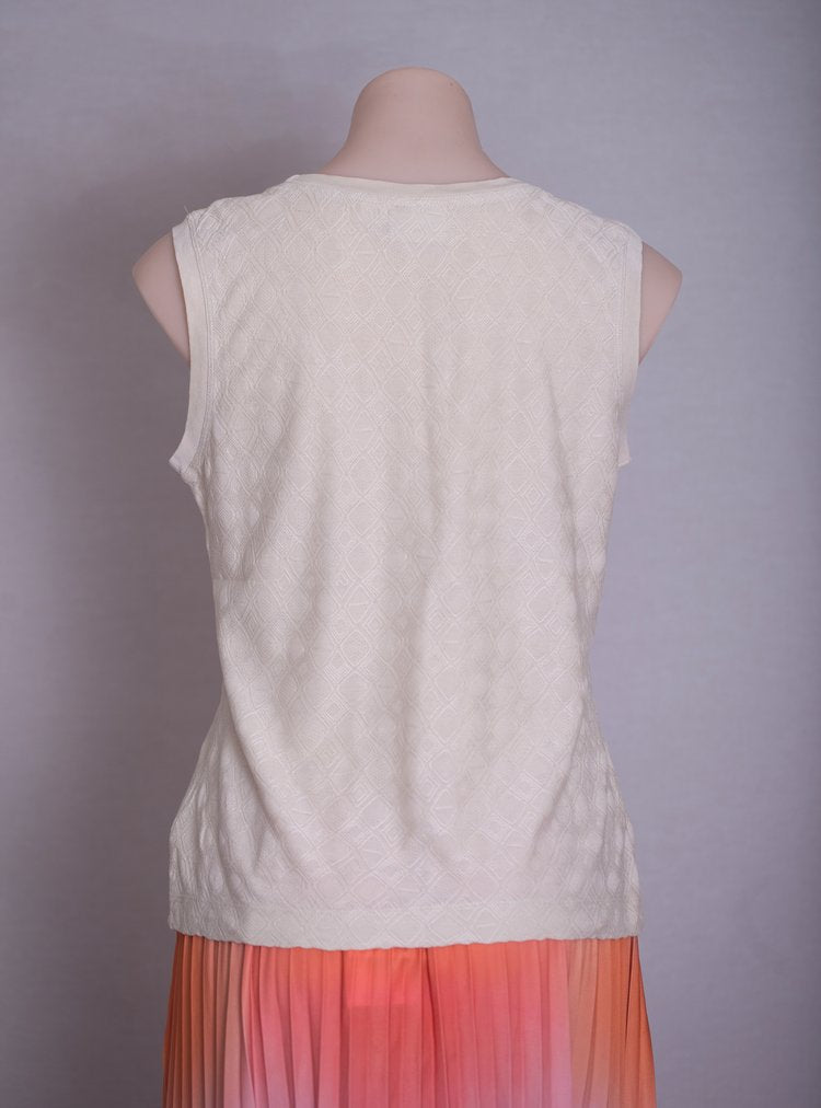 Ombre Peach Pleated Skirt and Country Road textured T-shirt.
