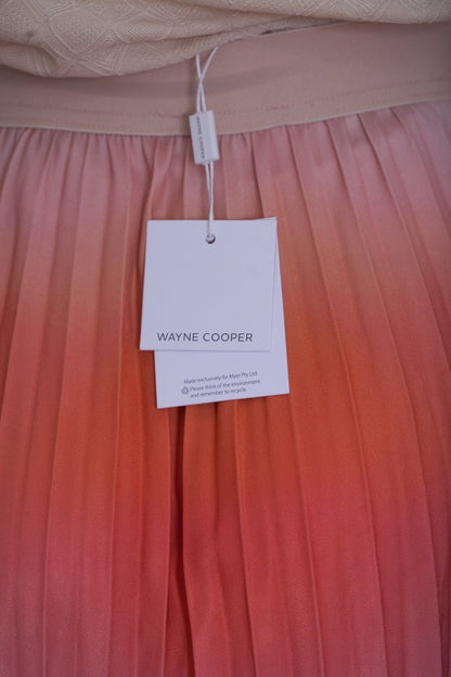 Ombre Peach Pleated Skirt and Country Road textured T-shirt.